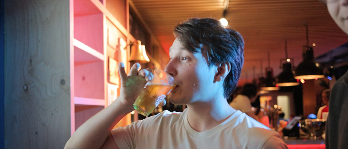 A Kinjin member drinking a beer in Hubble