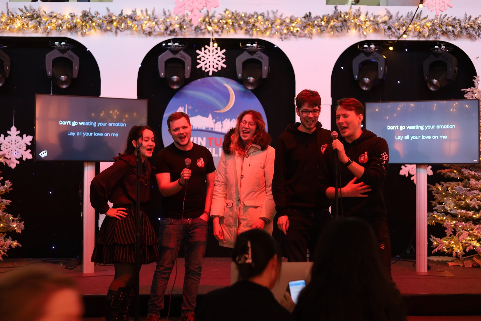 Kinjin members singing Karaoke at TU/e Winter Village